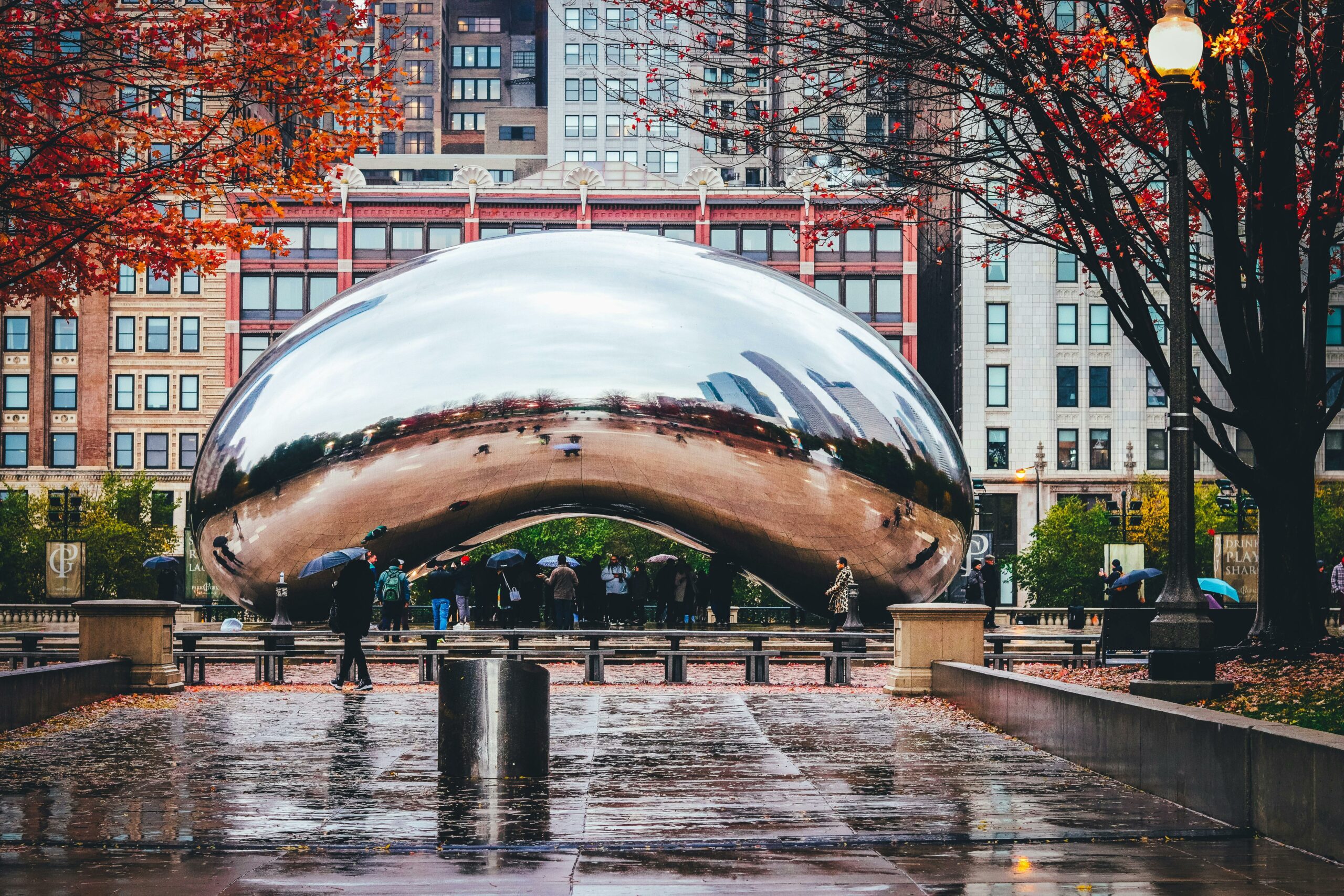 The iconic Cloud Gate sculpture, also known as The Bean, on a rainy day in Millennium Park, Chicago.