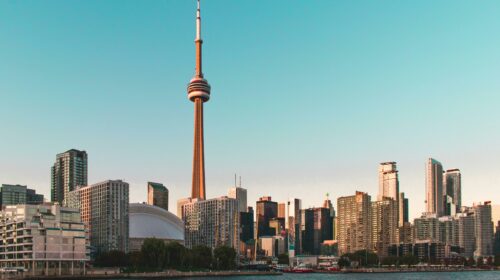 Beautiful view of Toronto's skyline featuring the iconic CN Tower during sunset.