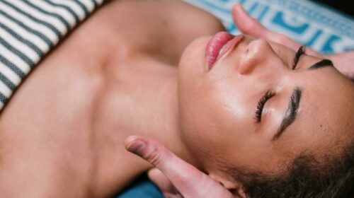 Indulge in a calming facial massage in a luxury spa setting, promoting relaxation and wellness.